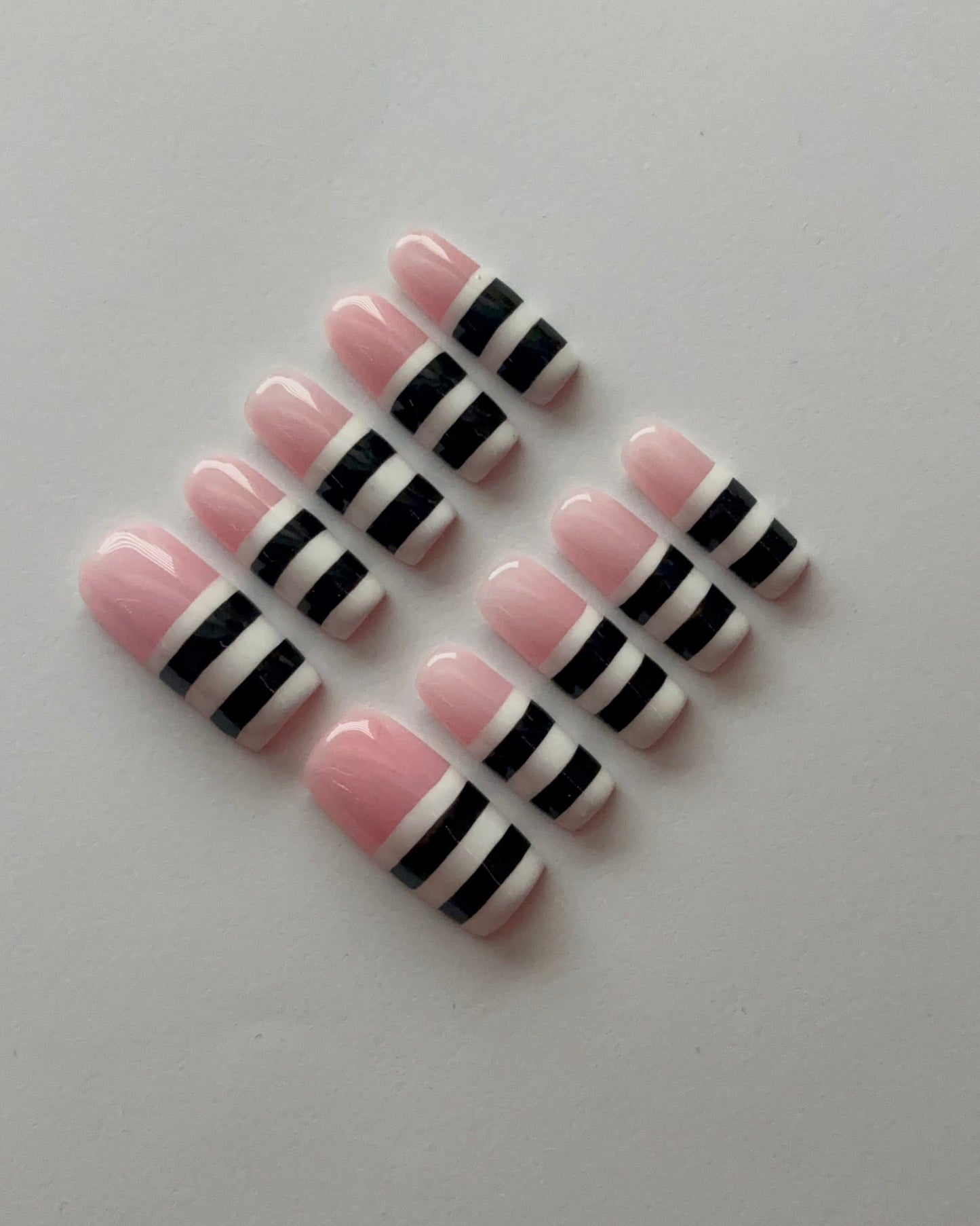 Striped Down press-on nails - flat lay