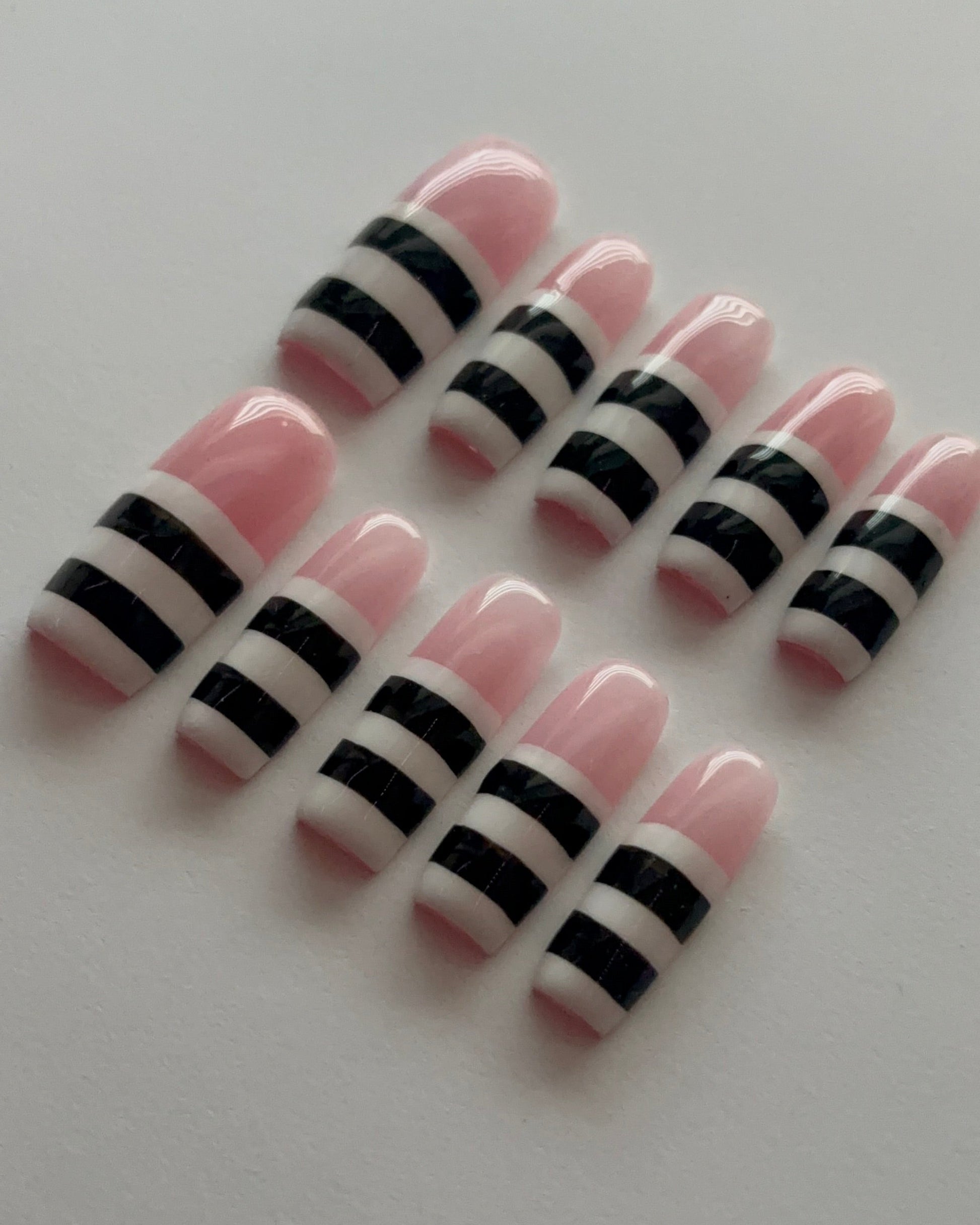 Striped Down press-on nails - angle view